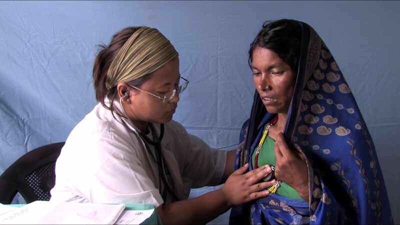 Medical Exam — People displaced by flooding see the doctor at the IDP campKeywords: Nepal, IDP, Internally Displaced