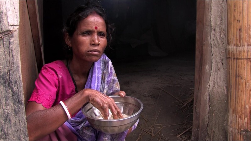 Eating Food — Displaced by floodin, emergency food supplies save lives. — Nepal, IDP, Internally Displaced