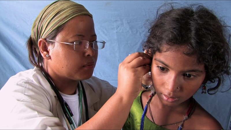 Medical Exam — People displaced by flooding see the doctor at the IDP campKeywords: Nepal, IDP, Internally Displaced