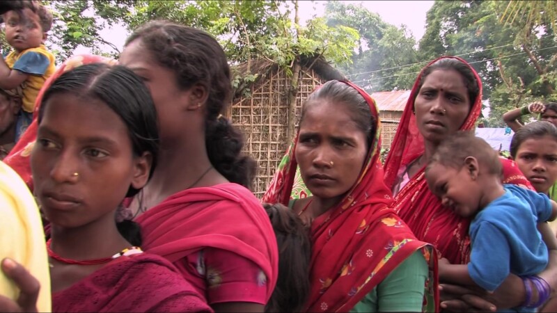 Food Distribution — People displaced by flooding line up for emergency food — Nepal, IDP, Internally Displaced