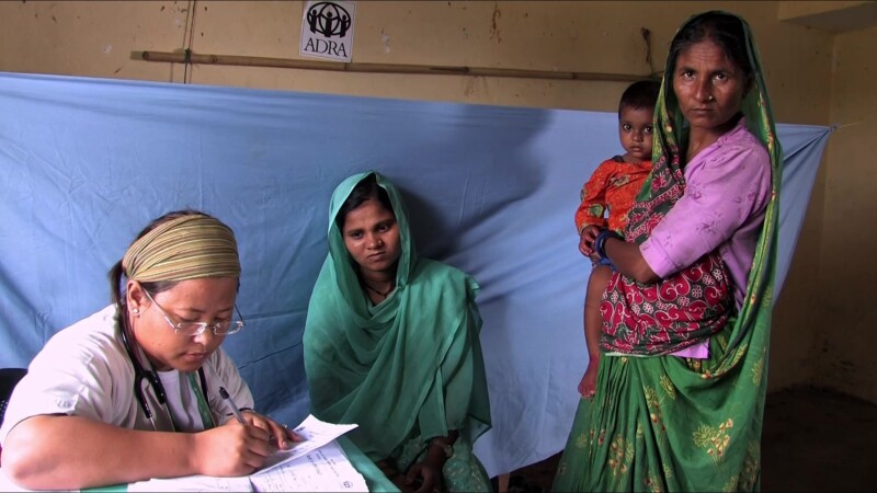 Medical Exam — People displaced by flooding see the doctor at the IDP campKeywords: Nepal, IDP, Internally Displaced