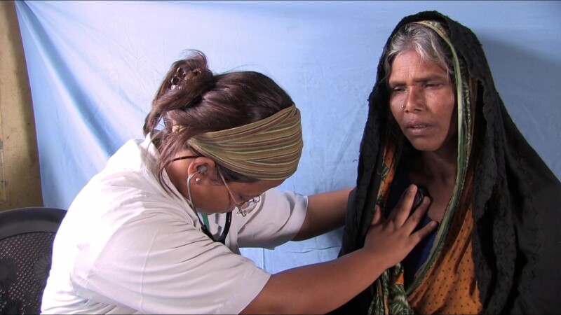 Medical Exam — People displaced by flooding see the doctor at the IDP campKeywords: Nepal, IDP, Internally Displaced