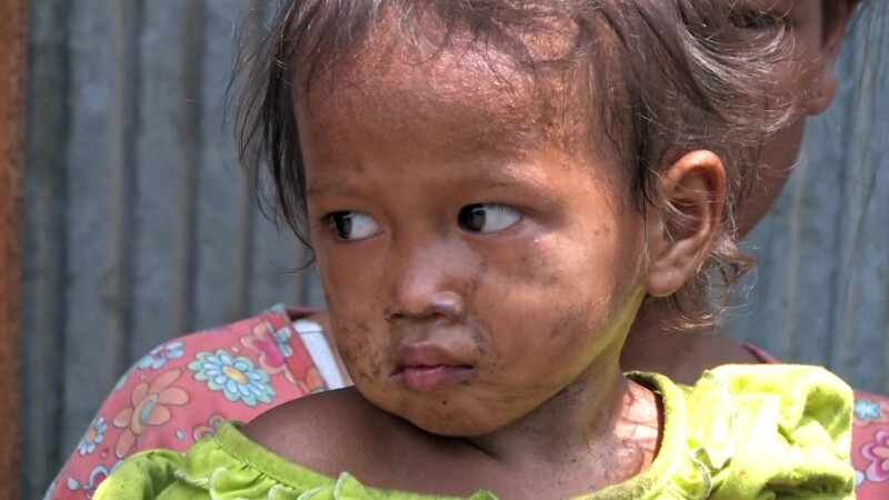 Child In Poverty — Young girl growing up in PovertyKeywords: Poverty, Shantytown, slum, squatter Settlement, girl, child, baby, poor