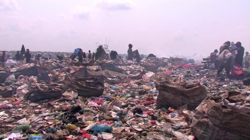 Working at the City Dump — People living in poverty scavage for recyalables to make a little cash. — Poverty, City Dump, Scavaging, Working at the City Dump,...