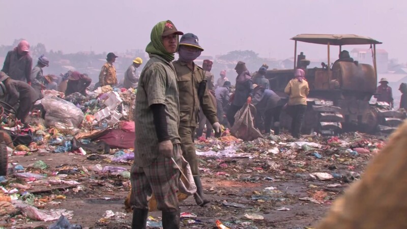 Working at the City Dump — People living in poverty scavage for recyalables to make a little cash. — Poverty, City Dump, Scavaging, Working at the City Dump,...