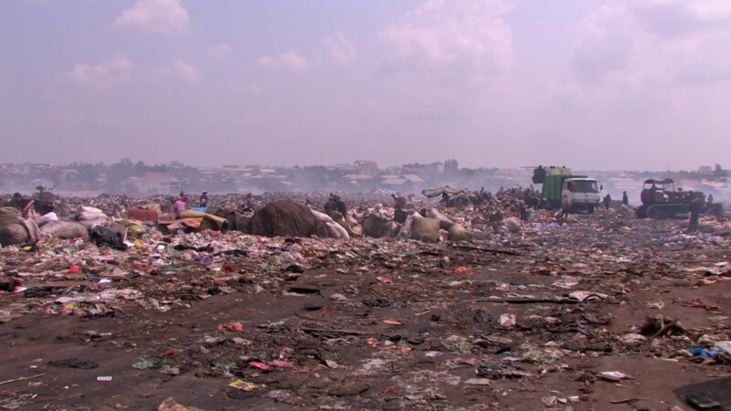 Working at the City Dump — People look for anything that they can sell to make a little money to eat. — Poverty, City Dump, Scavaging, Working at the City Du...