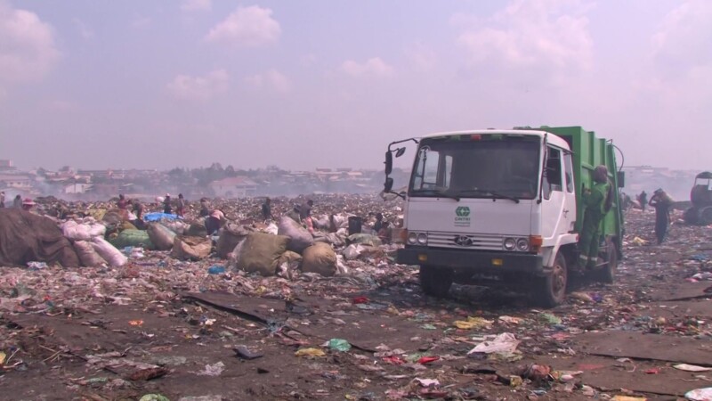 Working at the City Dump — People look for anything that they can sell to make a little money to eat. — Poverty, City Dump, Scavaging, Working at the City Du...