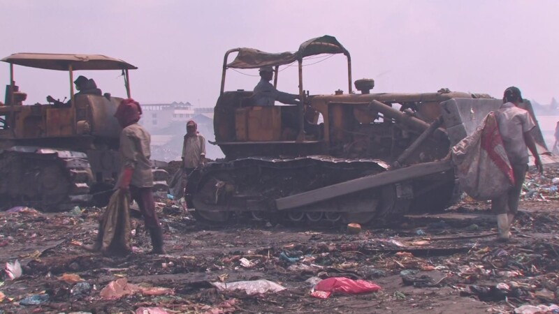 Working at the City Dump — People look for anything that they can sell to make a little money to eat. — Poverty, City Dump, Scavaging, Working at the City Du...