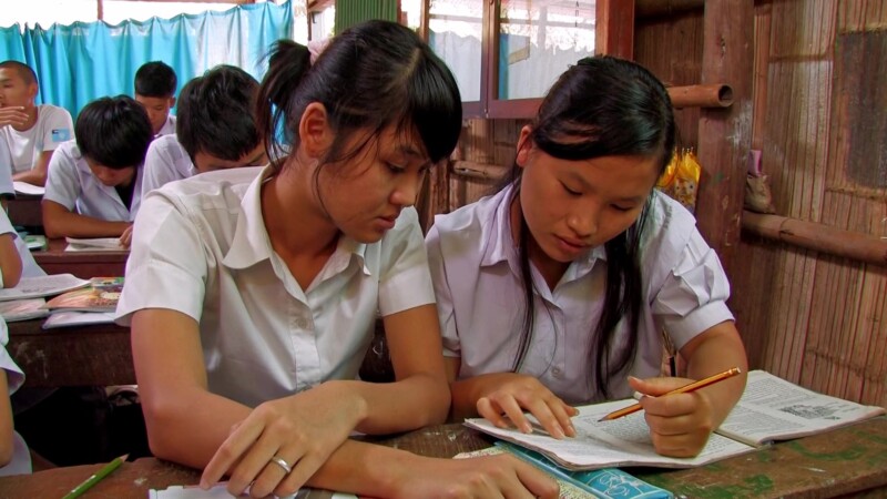 Refugee Children in School — Fleeing violence and death, Karen refugees from Myanmar, seek shelter across the border in Thailand, where their children grow u...