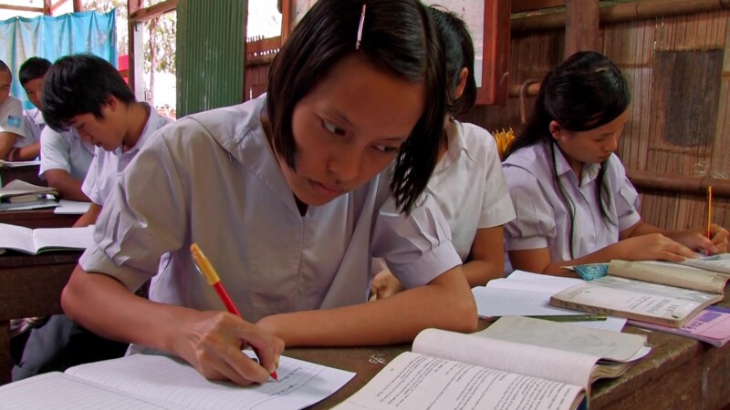 Refugee Children in School — Fleeing violence and death, Karen refugees from Myanmar, seek shelter across the border in Thailand, where their children grow u...
