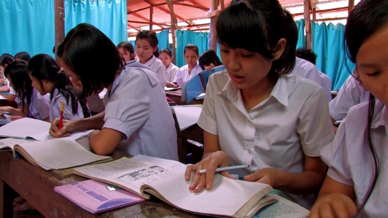 Refugee Children in School — Fleeing violence and death, Karen refugees from Myanmar, seek shelter across the border in Thailand, where their children grow u...