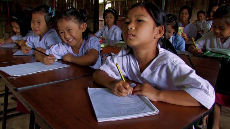 Refugee Children in School — Fleeing violence and death, Karen refugees from Myanmar, seek shelter across the border in Thailand, where their children grow u...