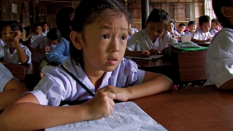 Refugee Children in School — Fleeing violence and death, Karen refugees from Myanmar, seek shelter across the border in Thailand, where their children grow u...