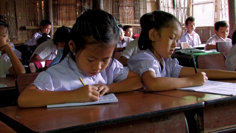Refugee Children in School — Fleeing violence and death, Karen refugees from Myanmar, seek shelter across the border in Thailand, where their children grow u...