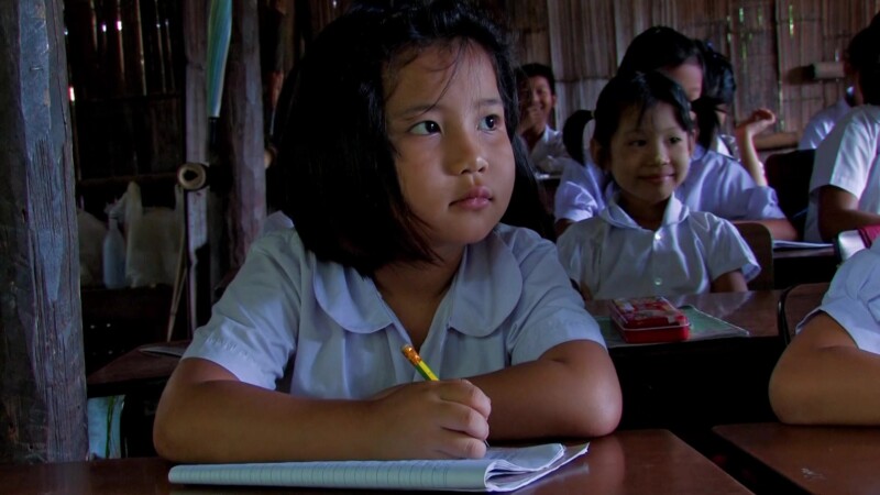 Refugee Children in School — Fleeing violence and death, Karen refugees from Myanmar, seek shelter across the border in Thailand, where their children grow u...