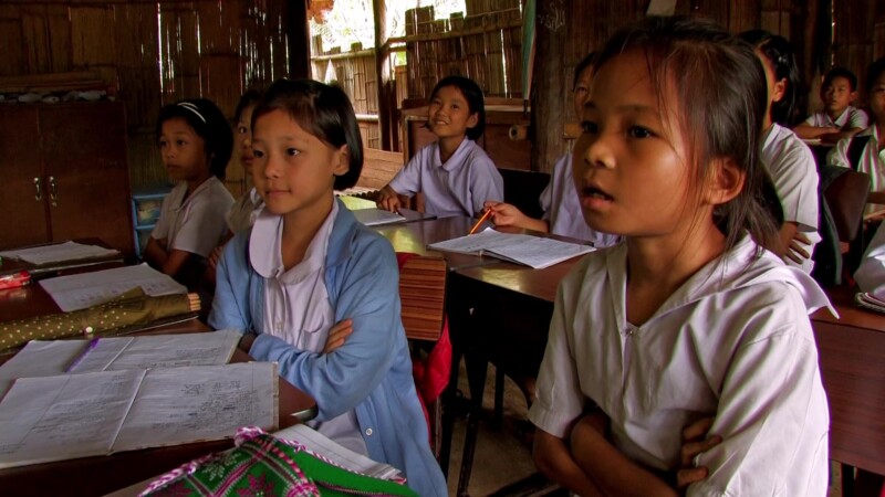 Refugee Children in School — Fleeing violence and death, Karen refugees from Myanmar, seek shelter across the border in Thailand, where their children grow u...
