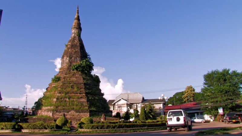 Round About in Vientiane — In downtown Vientiane, Laos, a round about surrounds an old Buddhist monument — Laos, Vientiane, Buddhist, road