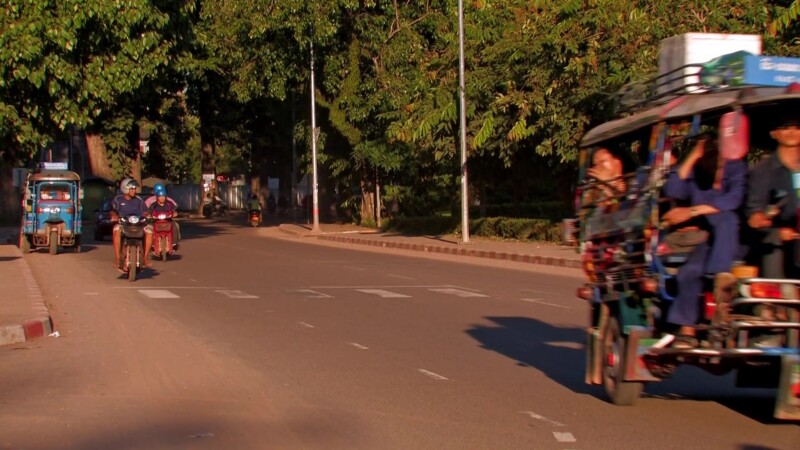 Street Scene in Vientiane — Typical street traffic in the capital city of VientianeKeywords: Laos, Vientiane, streets, traffic