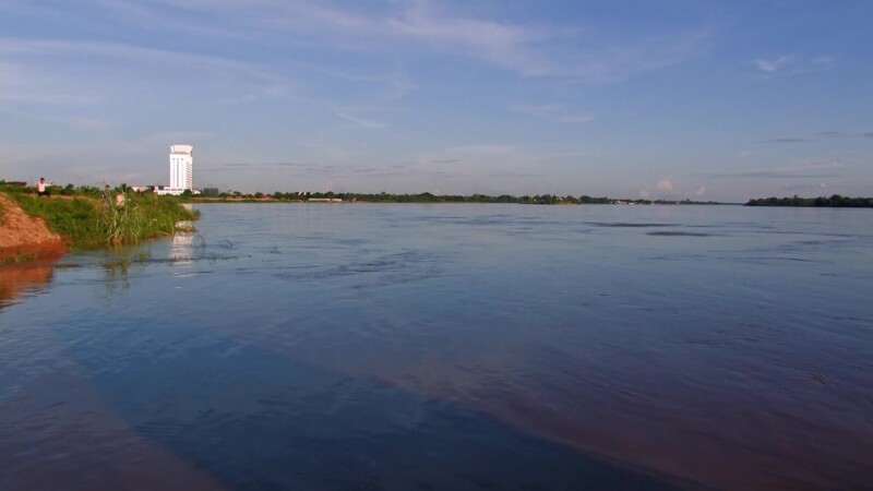 Mighty Mekong River in Laos — The Mekong river flows through Laos, providing life and transportation — Laos, Mekong River, Scenic