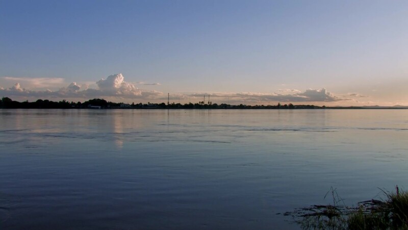 Mighty Mekong River in Laos — The Mekong river flows through Laos, providing life and transportation — Laos, Mekong River, Scenic