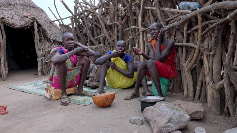 Children Eat — Children in South Sudan, Africa eat a simple meal of sorghum. — Africa, South Sudan, Rural, Remote, Pastoralists