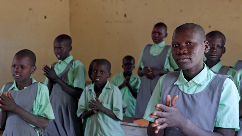 Singing In School in Africa — Students in South Sudan sig about how happy they are to attend school and learn. — Africa, South Sudan, Rural, Remote, Pastoral...