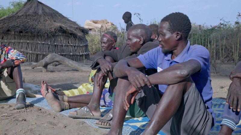 Savings and Loans Group — Villagers in South Sudan attend their weekly meeting to learn about finance and participate in a village Savings and loans program,...