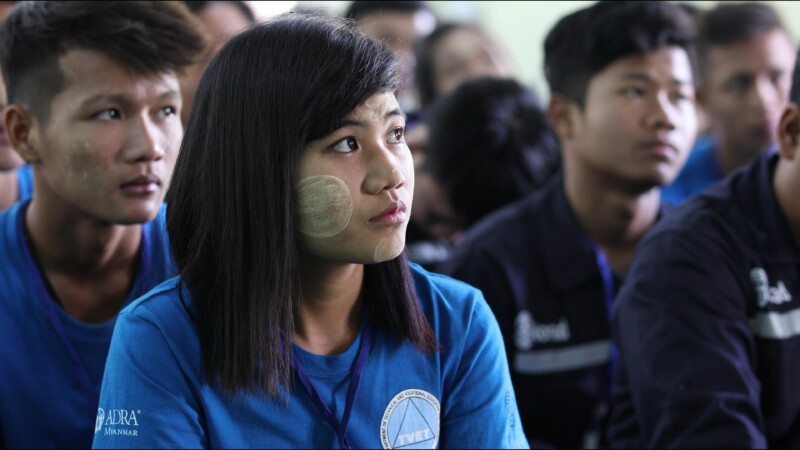 Morning Assembly — Students gather in the main hall of a trade school built and run by ADRA to help young, out of school youth develop life and income skills...