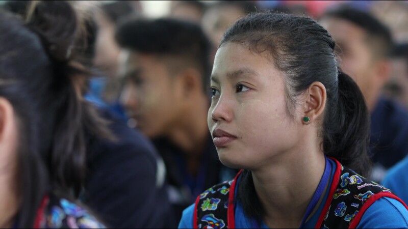 Morning Assembly — Students gather in the main hall of a trade school built and run by ADRA to help young, out of school youth develop life and income skills...