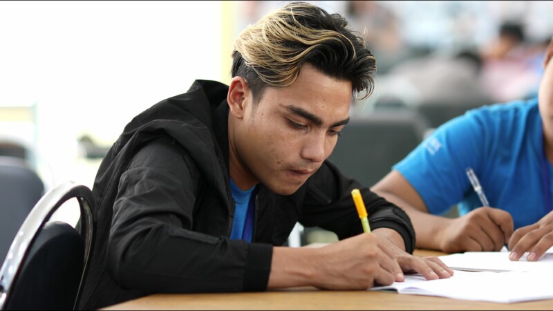 Writing Exam — Student at a trade school in Myanmar takes exam. — Myanmar, Burma, Burmese, Karen, student