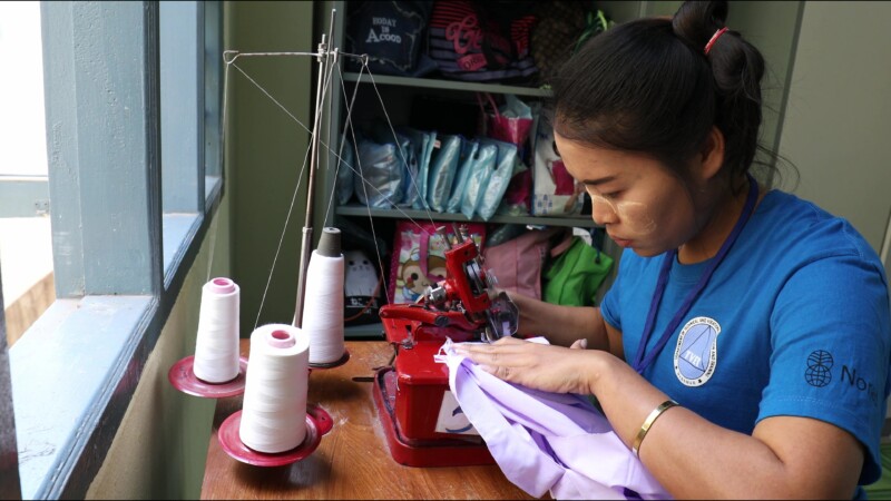Learning Tailoring — Young women in Myanmar learn the craft of tailoring at a trade school built and run by ADRA. — Myanmar, Burma, Burmese, Karen, livelihoods