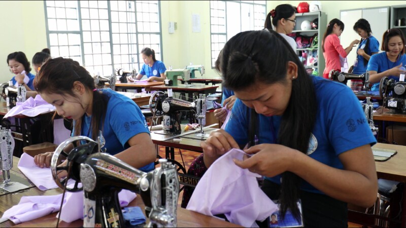 Learning Tailoring — Young women in Myanmar learn the craft of tailoring at a trade school built and run by ADRA. — Myanmar, Burma, Burmese, Karen, livelihoods
