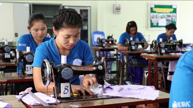 Learning Tailoring — Young women in Myanmar learn the craft of tailoring at a trade school built and run by ADRA. — Myanmar, Burma, Burmese, Karen, livelihoods