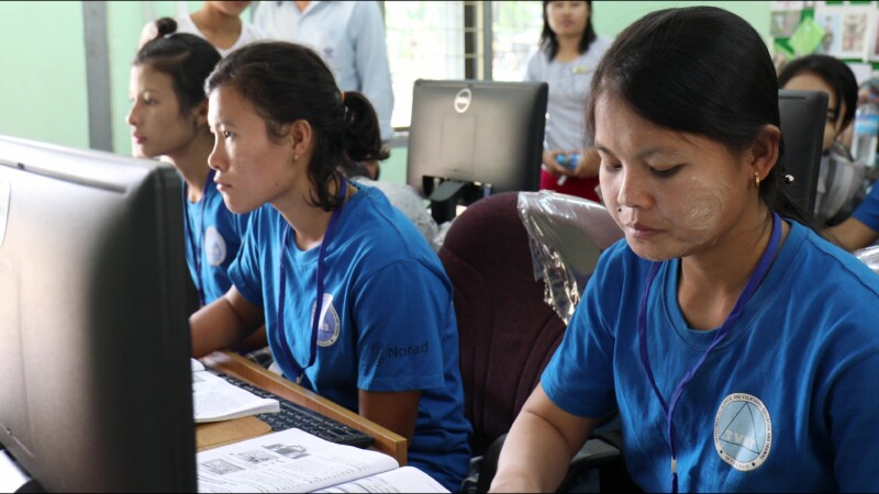 Learning Computer Skills — At a trade school in Myanmar, run by ADRA, young people learn computer skills to prepare them to become office workers. — Myanmar,...