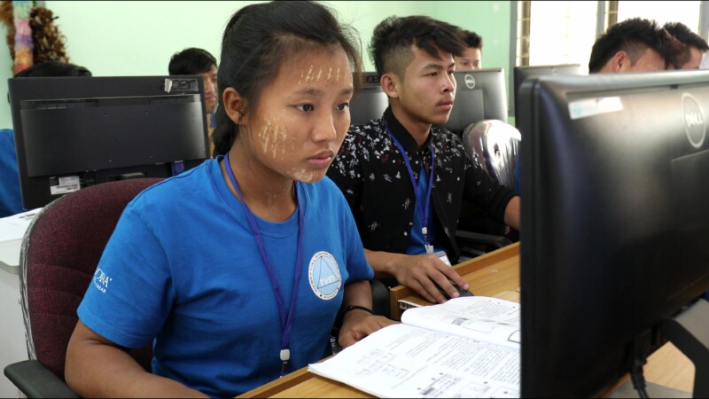 Learning Computer Skills — At a trade school in Myanmar, run by ADRA, young people learn computer skills to prepare them to become office workers. — Myanmar,...