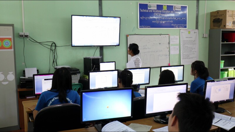 Learning Computer Skills — At a trade school in Myanmar, run by ADRA, young people learn computer skills to prepare them to become office workers. — Myanmar,...