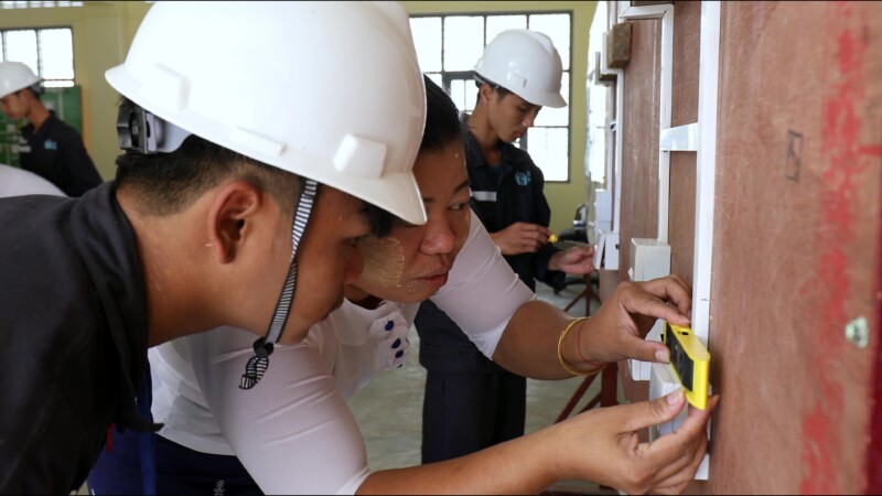 Electrition Training — Young men in Myanmar learn the skill of how to wire houses for electricityKeywords: Myanmar, Burma, Burmese, Karen, student, trade sch...