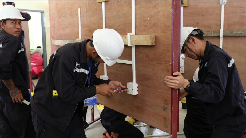 Electrition Training — Young men in Myanmar learn the skill of how to wire houses for electricityKeywords: Myanmar, Burma, Burmese, Karen, student, trade sch...