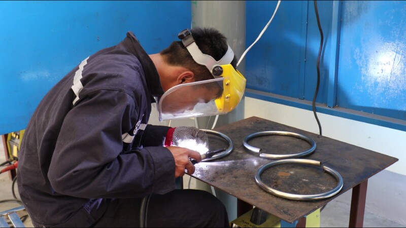 Learning How to Weld — At a trade school in Myanmar, students learn the skill of welding to prepare them with an livelihood skill. — Myanmar, Burma, Burmese,...