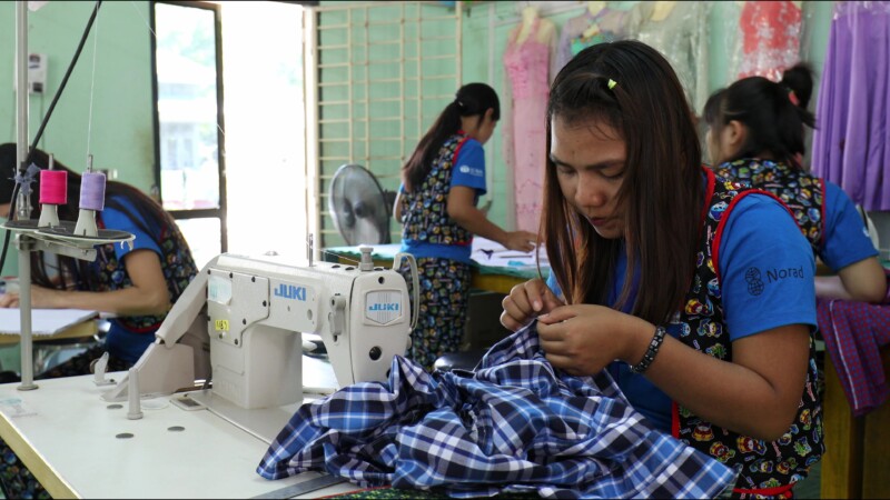 Learning Tailoring — Young women in Myanmar learn the craft of tailoring at a trade school built and run by ADRA. — Myanmar, Burma, Burmese, Karen, livelihoods