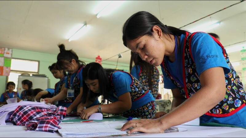 Learning Tailoring — Young women in Myanmar learn the craft of tailoring at a trade school built and run by ADRA. — Myanmar, Burma, Burmese, Karen, livelihoods