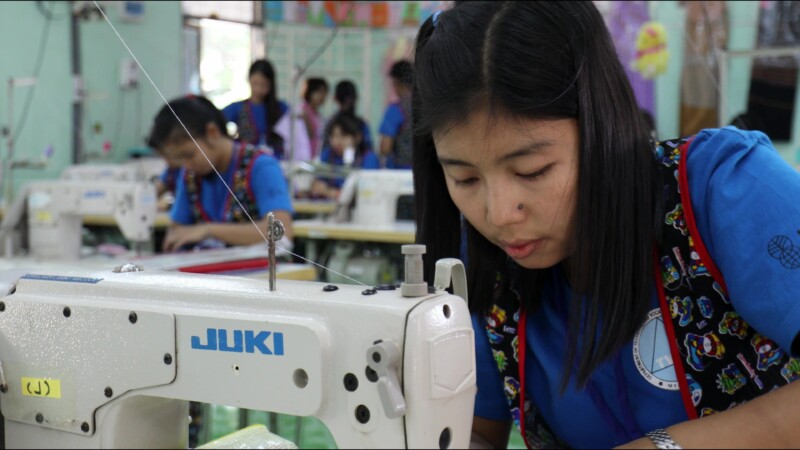 Learning Tailoring — Young women in Myanmar learn the craft of tailoring at a trade school built and run by ADRA. — Myanmar, Burma, Burmese, Karen, livelihoods