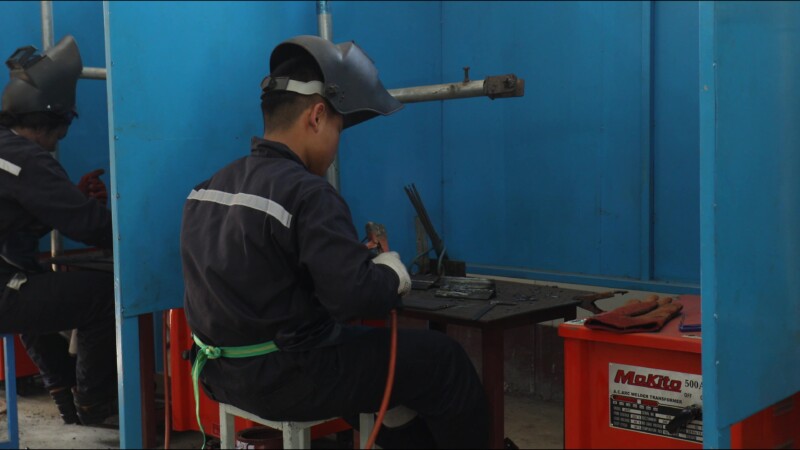 Learning How to Weld — At a trade school in Myanmar, students learn the skill of welding to prepare them with an livelihood skill. — Myanmar, Burma, Burmese,...