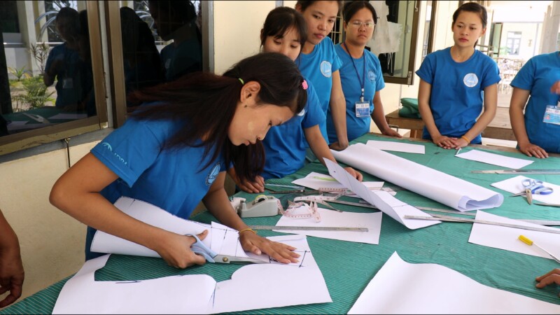 Attending a Trade school — Young hearing impaired girl goes to a trade school each day to learn how to make clothes so she can start her own income generatin...