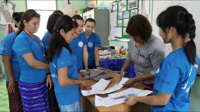 Attending a Trade school — Young hearing impaired girl goes to a trade school each day to learn how to make clothes so she can start her own income generatin...