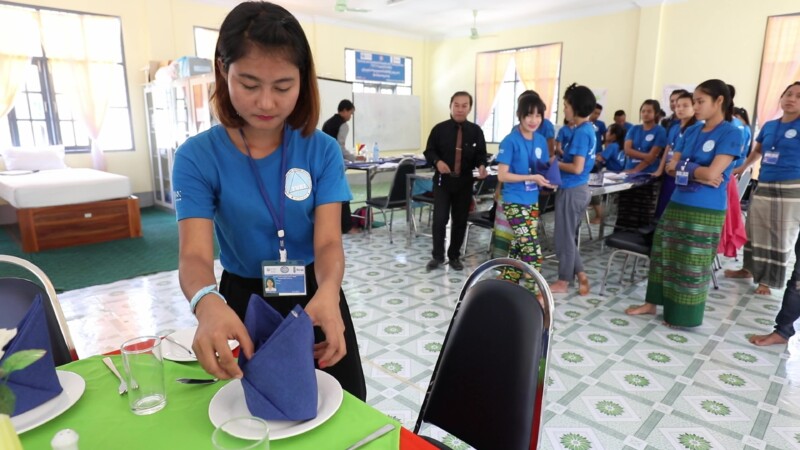Learning Hospitality Business — Young girl learns how to work at a hotel in Myanmar by attending classes at a Trade School. — Myanmar, Burma, Burmese, Karen,...