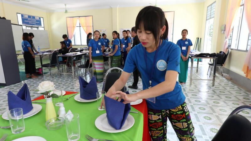 Learning Hospitality Business — Young girl learns how to work at a hotel in Myanmar by attending classes at a Trade School. — Myanmar, Burma, Burmese, Karen,...