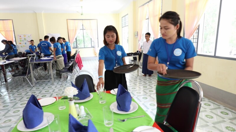 Learning Hospitality Business — Young girl learns how to work at a hotel in Myanmar by attending classes at a Trade School. — Myanmar, Burma, Burmese, Karen,...