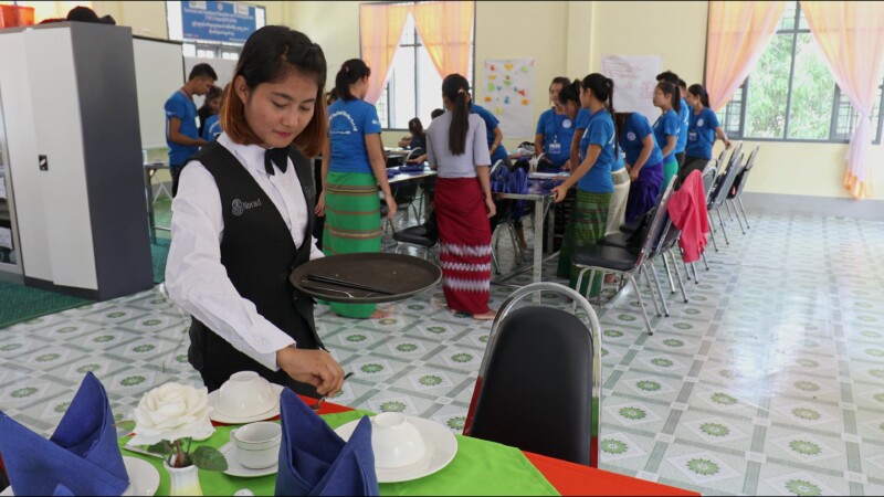 Learning Hospitality Business — Young girl learns how to work at a hotel in Myanmar by attending classes at a Trade School. — Myanmar, Burma, Burmese, Karen,...