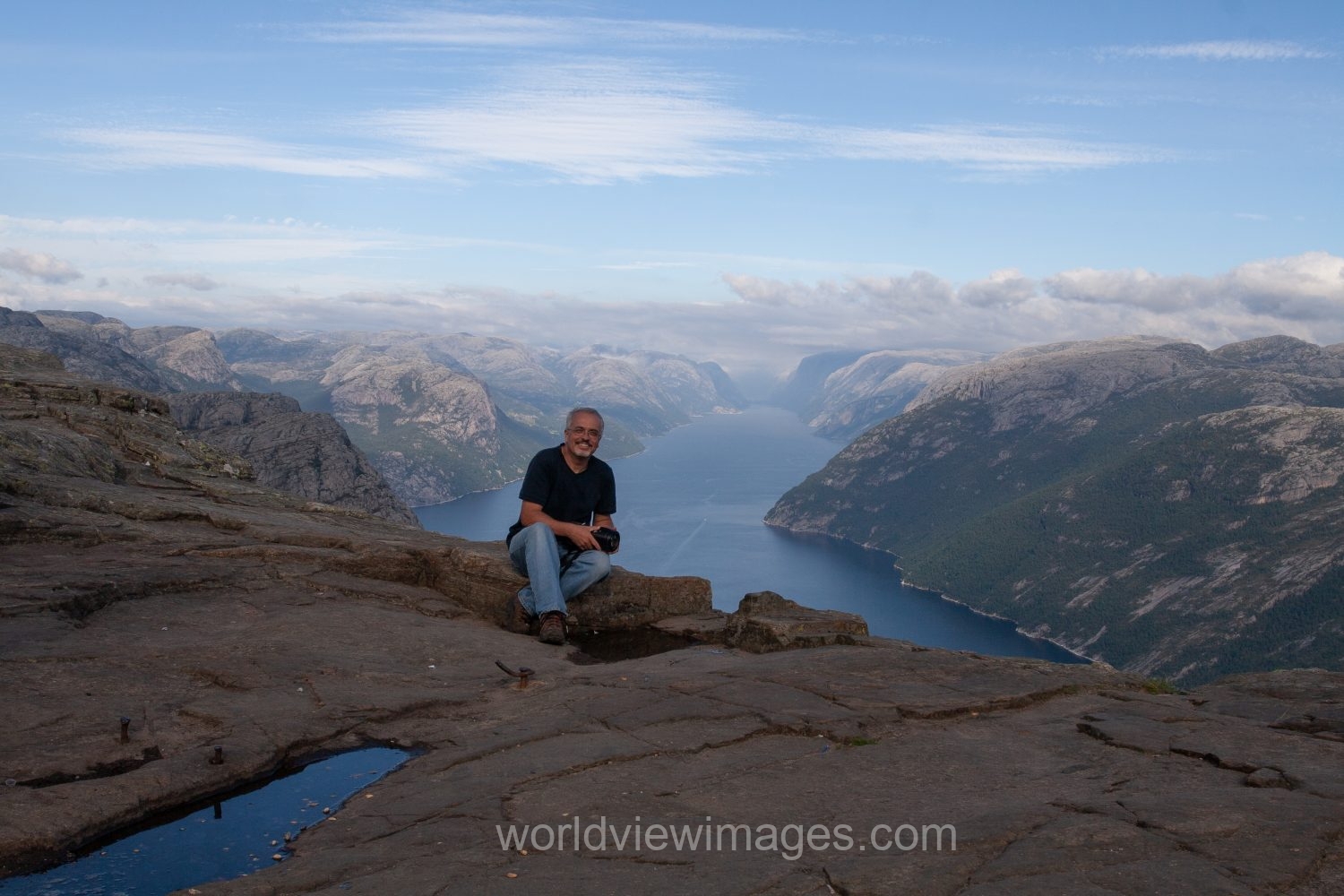 Photographer on Pulpit Rock in Norway